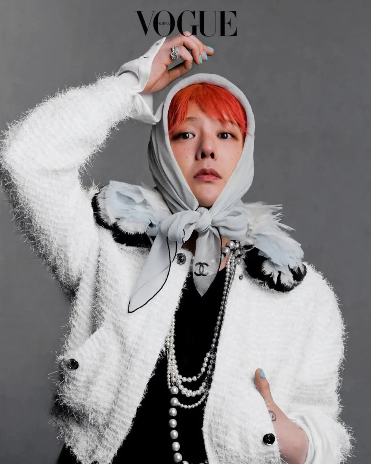 G-Dragon Pioneers 2025 Fashion Trend: Scarves as a Style Staple, According to Vogue